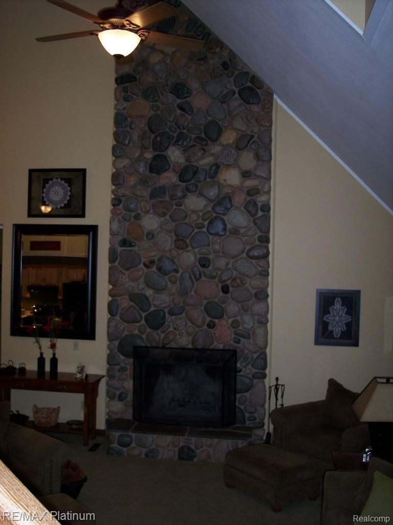 7117 North Fleming Road Fowlerville, MI 48836 - Photo 32 of 97 REAL STONE FIREPLACE