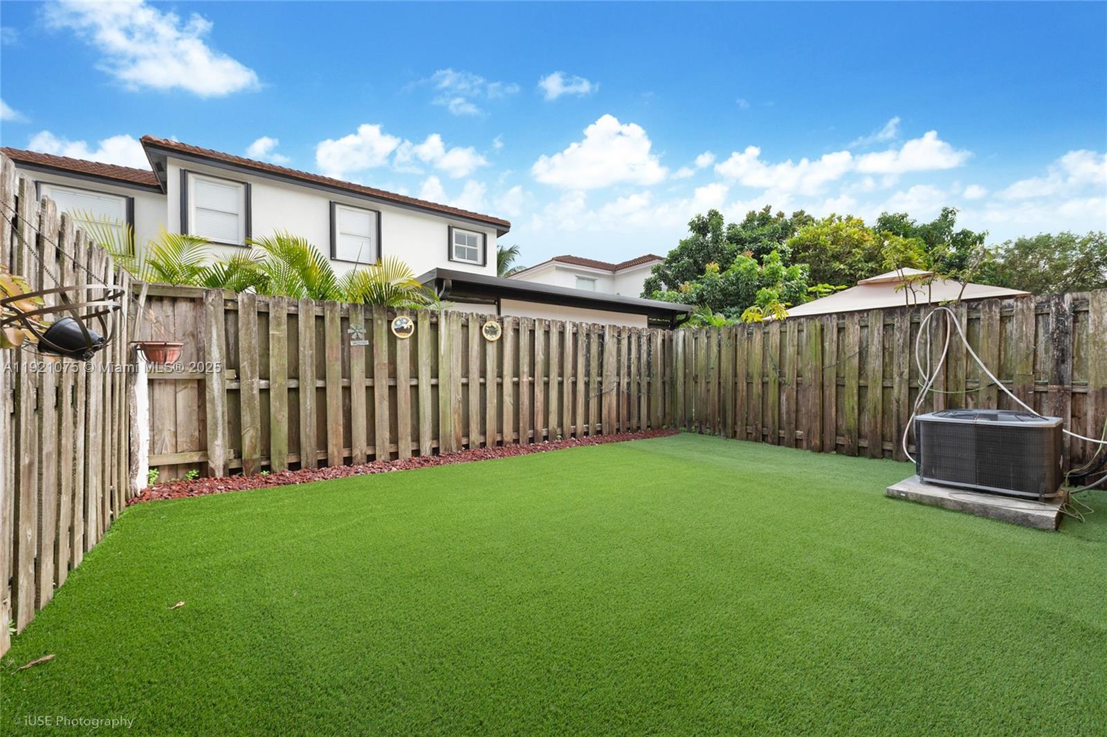 24331 Southwest 108th Place Homestead, FL 33032 - Photo 14 of 15 a view of a backyard with a garden