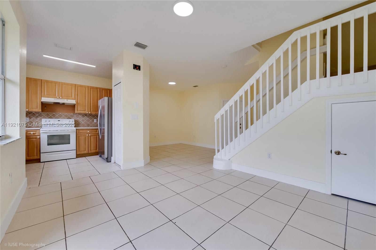 24331 Southwest 108th Place Homestead, FL 33032 - Photo 5 of 15 a view of a kitchen with a sink and an entryway
