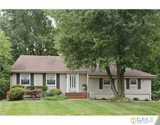 10 Midland Road Edison, NJ 08820 - Photo 1 of 18 a front view of a house with a yard