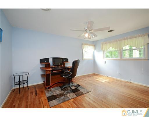10 Midland Road Edison, NJ 08820 - Photo 14 of 18 a workspace with furniture window and wooden floor