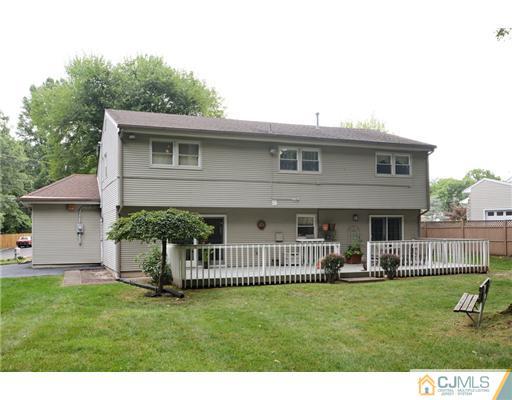 10 Midland Road Edison, NJ 08820 - Photo 17 of 18 a front view of a house with a garden