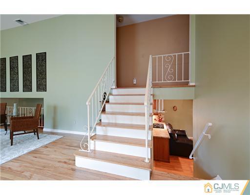 10 Midland Road Edison, NJ 08820 - Photo 3 of 18 a view of entryway and hall with wooden floor