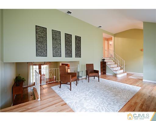 10 Midland Road Edison, NJ 08820 - Photo 4 of 18 a living room with furniture rug and wooden floor