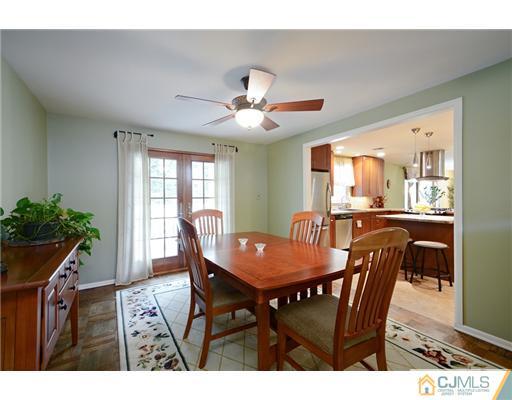 10 Midland Road Edison, NJ 08820 - Photo 6 of 18 a view of a dining room with furniture and window