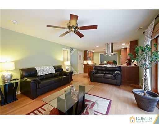 10 Midland Road Edison, NJ 08820 - Photo 10 of 18 a living room with furniture and a flat screen tv