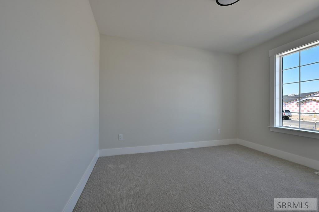 499 Fieldstone Avenue Rigby, ID 83442 - Photo 9 of 14 Bedroom 2