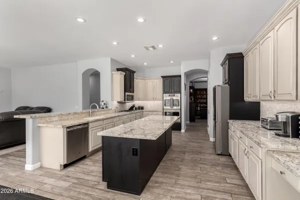 a kitchen with sink and window