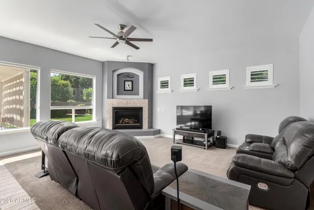 a large bathroom with a large tub and double vanity