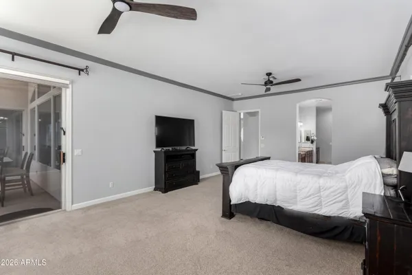 a bathroom with bathtub and window