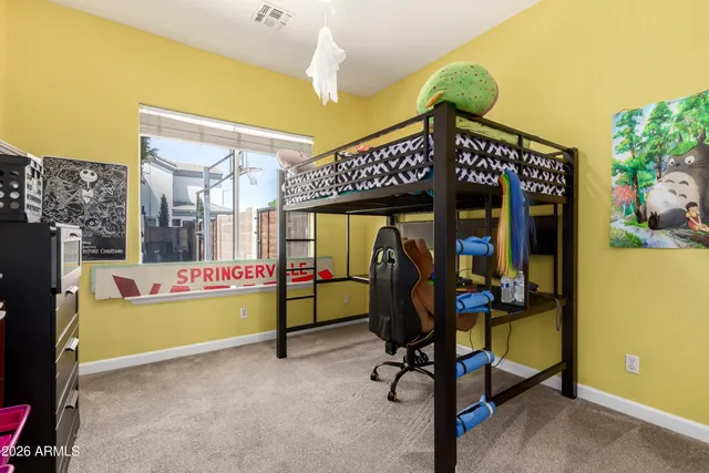 a table room with furniture and a wooden floor