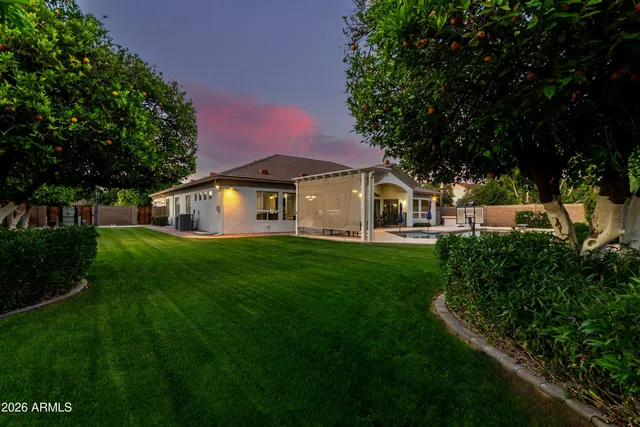 an aerial view of a house with a garden and plants