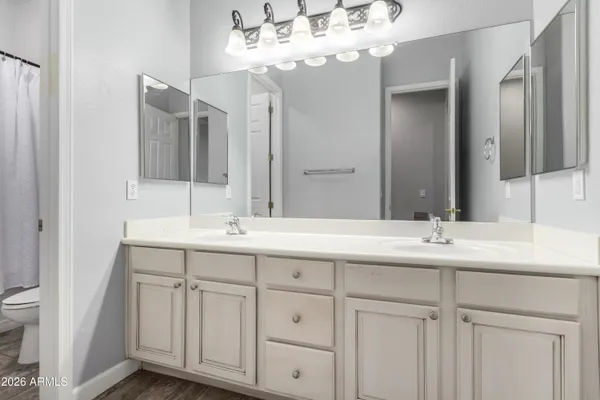 a table room with furniture and a wooden floor