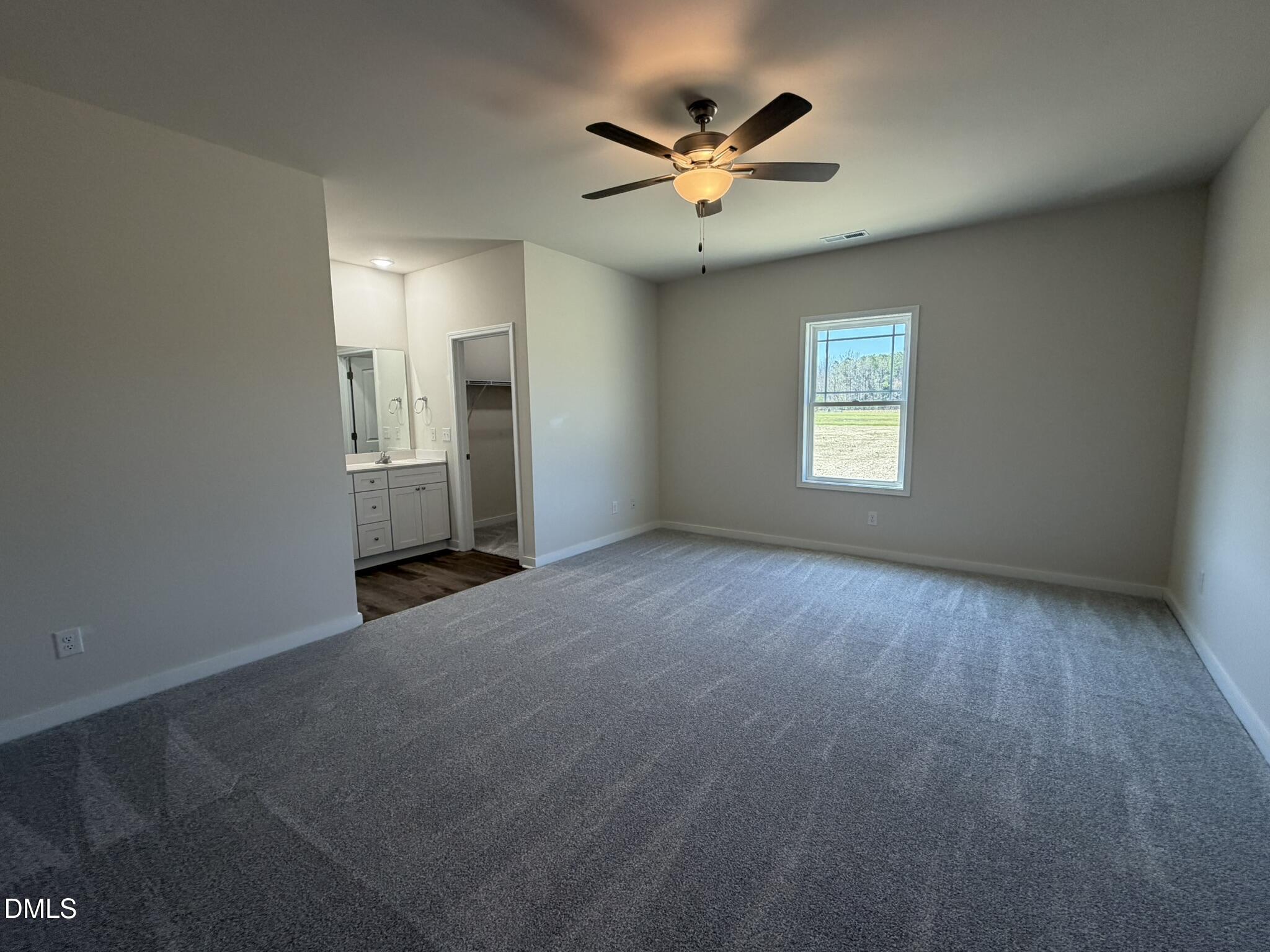 159 Jacobs Ridge Drive Four Oaks, NC 27524 - Photo 12 of 19 a view of an empty room with a window
