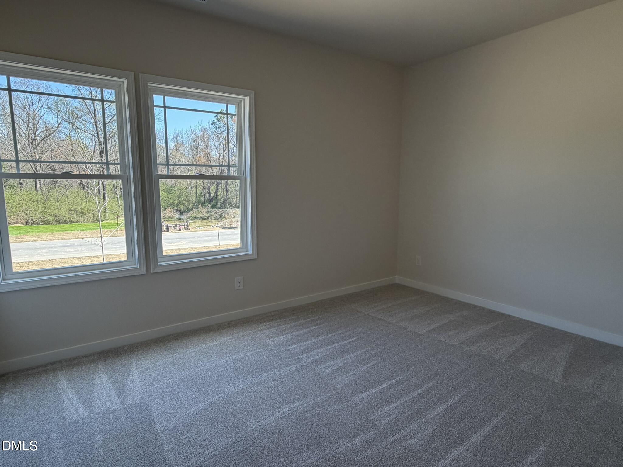 159 Jacobs Ridge Drive Four Oaks, NC 27524 - Photo 15 of 19 an empty room with a window