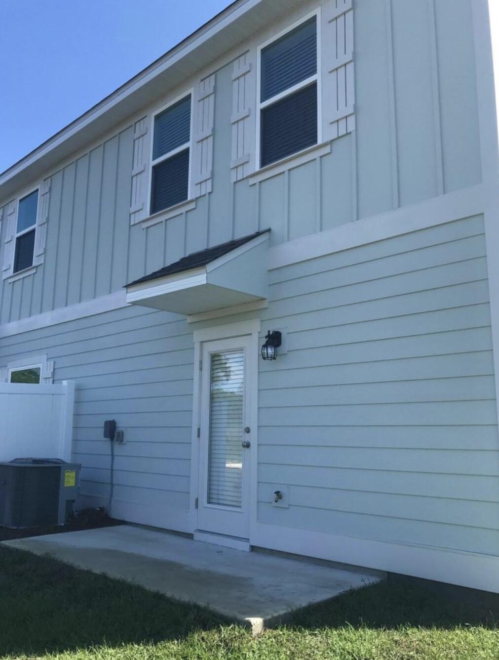 89 Crossing Lane, Unit A Santa Rosa Beach, FL 32459 - Photo 14 of 17 a view of front door of house