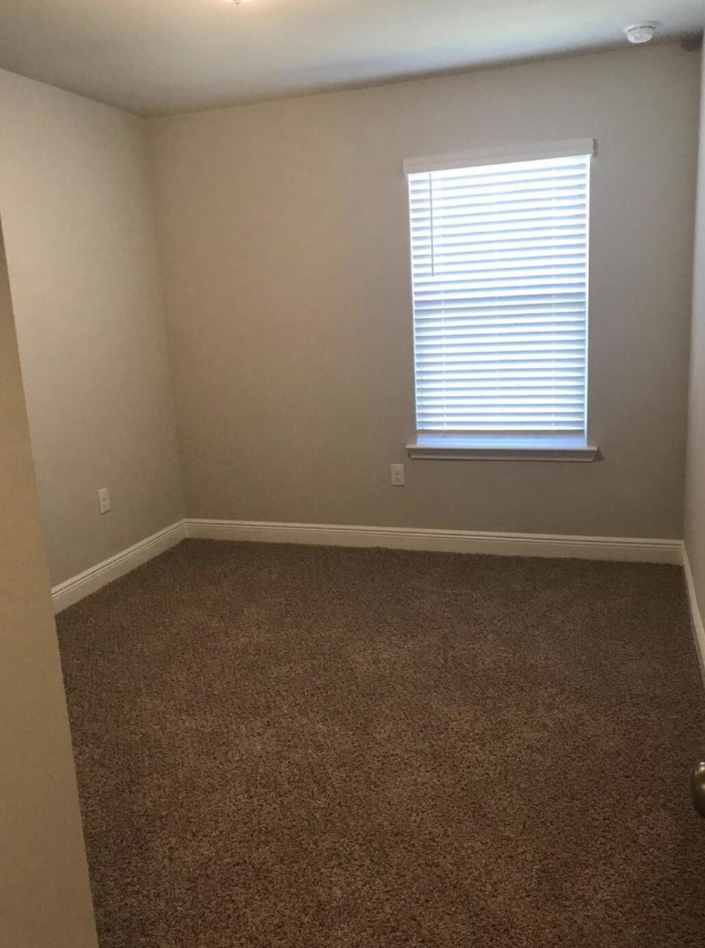 89 Crossing Lane, Unit A Santa Rosa Beach, FL 32459 - Photo 16 of 17 an empty room with a window