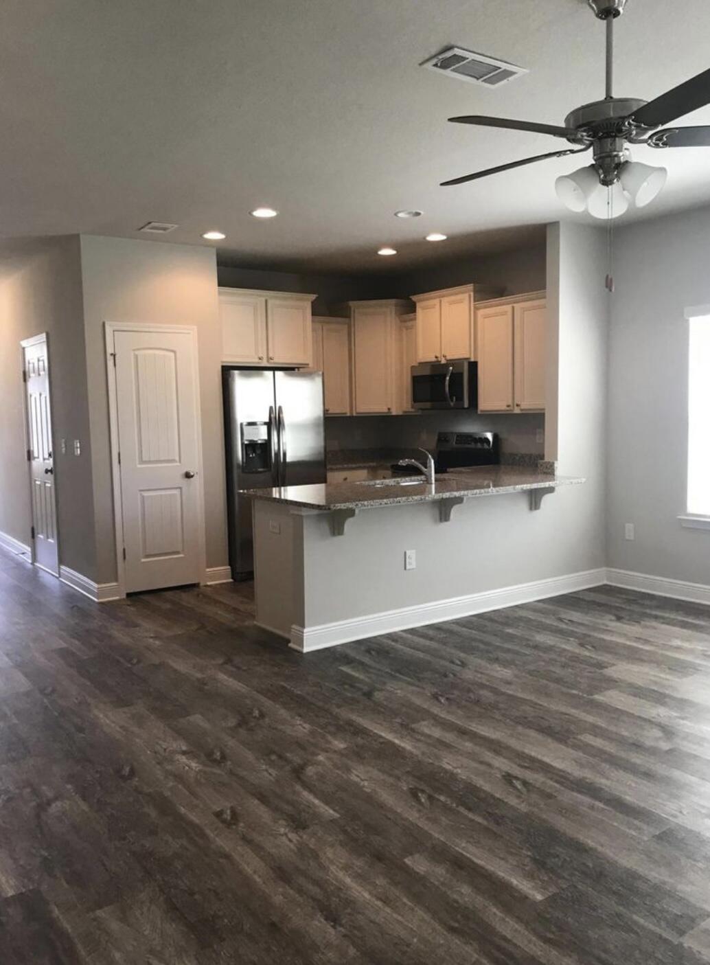 89 Crossing Lane, Unit A Santa Rosa Beach, FL 32459 - Photo 5 of 17 a view of kitchen and microwave