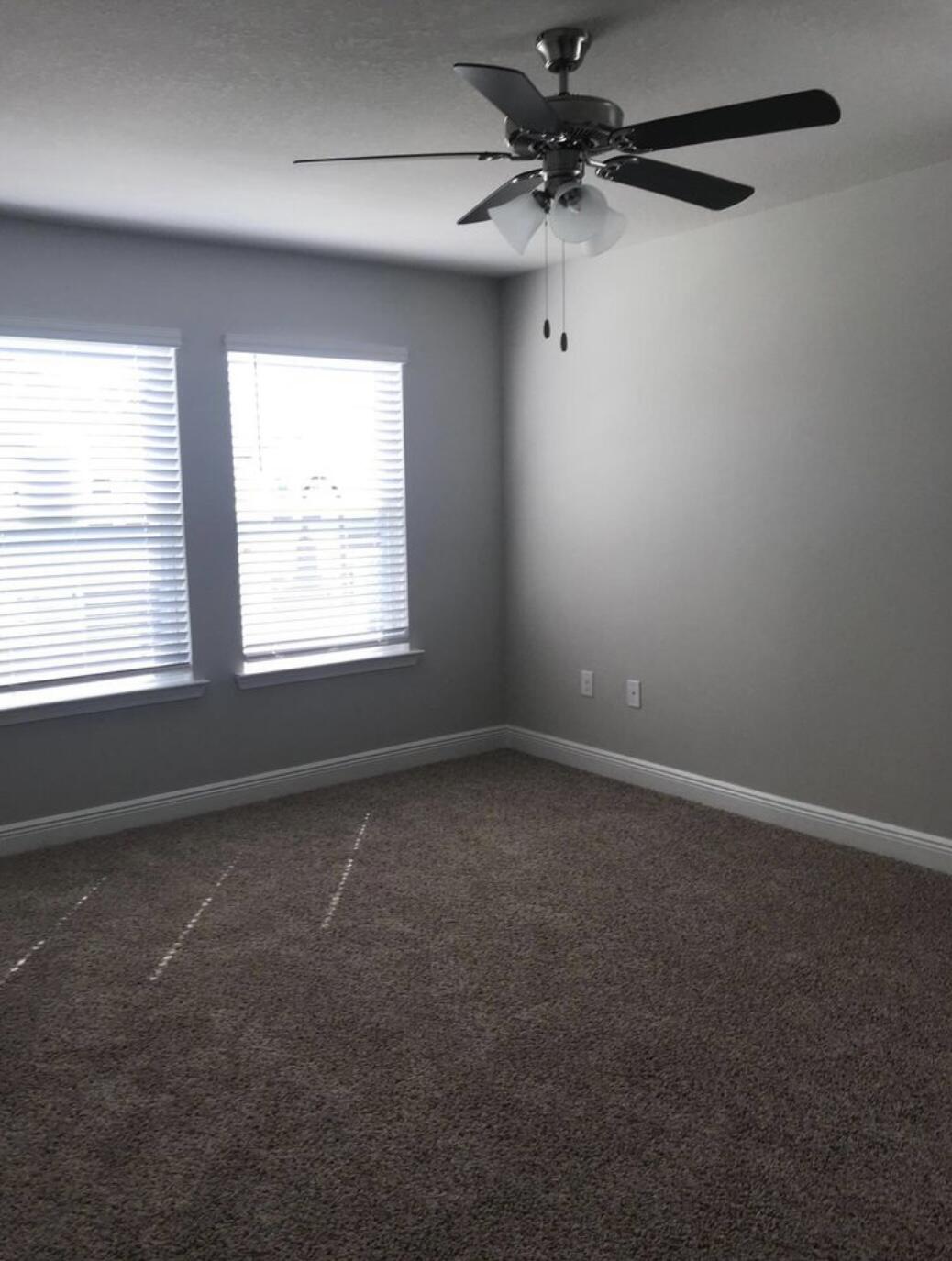 89 Crossing Lane, Unit A Santa Rosa Beach, FL 32459 - Photo 9 of 17 an empty room with a window