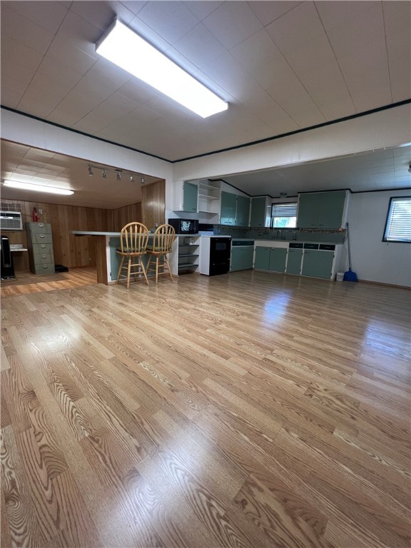 604 Southwest 9th Street Premont, TX 78375 - Photo 6 of 16 a room with furniture and a wooden floor
