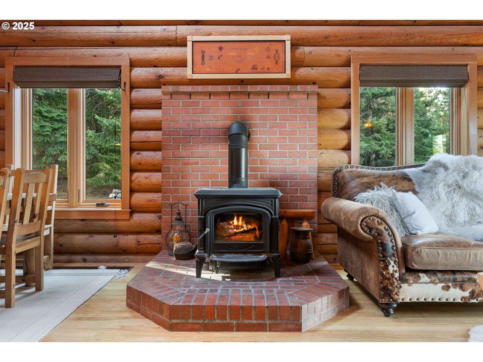 2300 Elder Road Hood River, OR 97031 - Photo 17 of 48 a living room with furniture and a fireplace