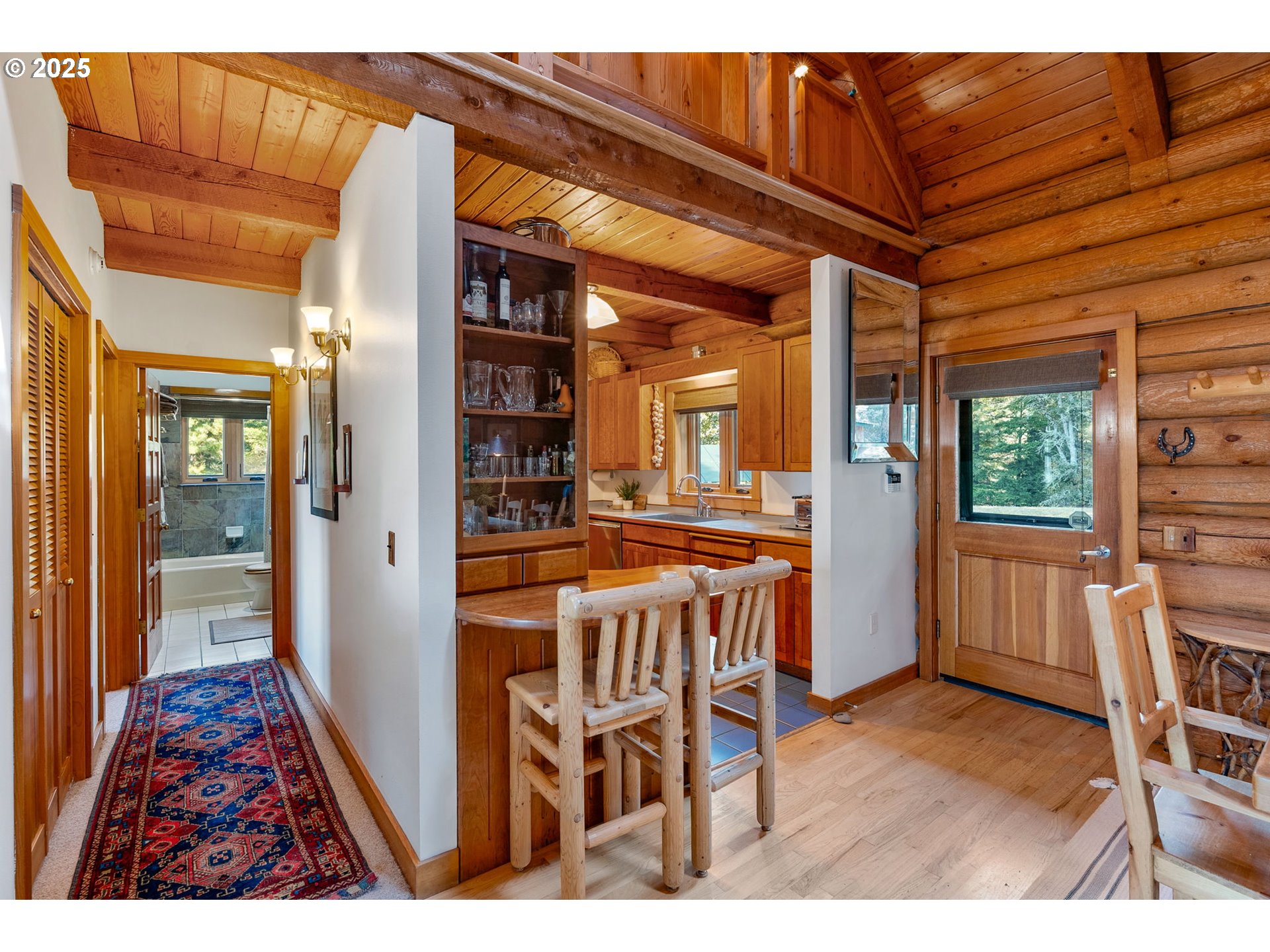 2300 Elder Road Hood River, OR 97031 - Photo 19 of 48 a dining room with furniture and wooden floor