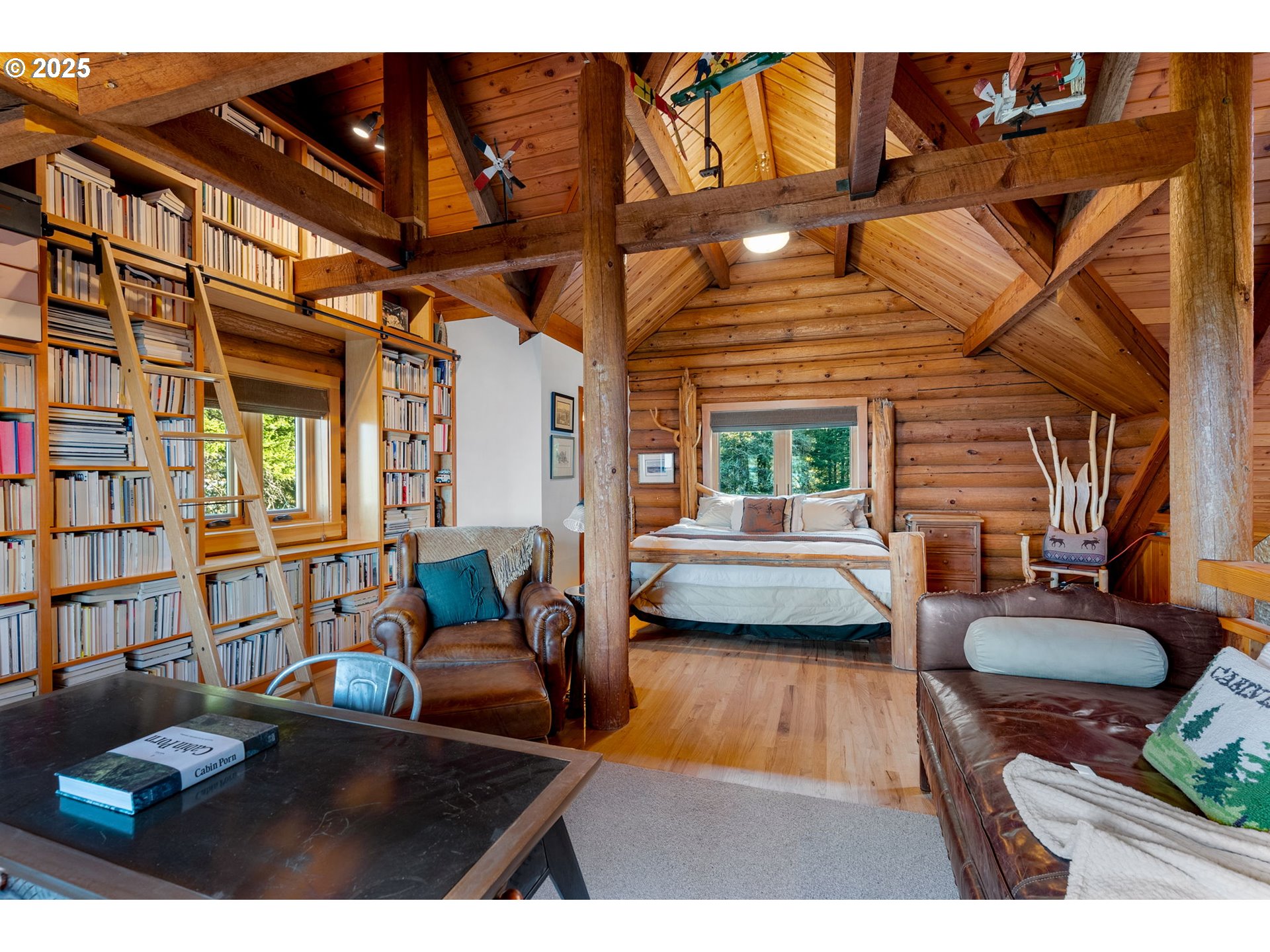 2300 Elder Road Hood River, OR 97031 - Photo 32 of 48 a bedroom with furniture and a couch