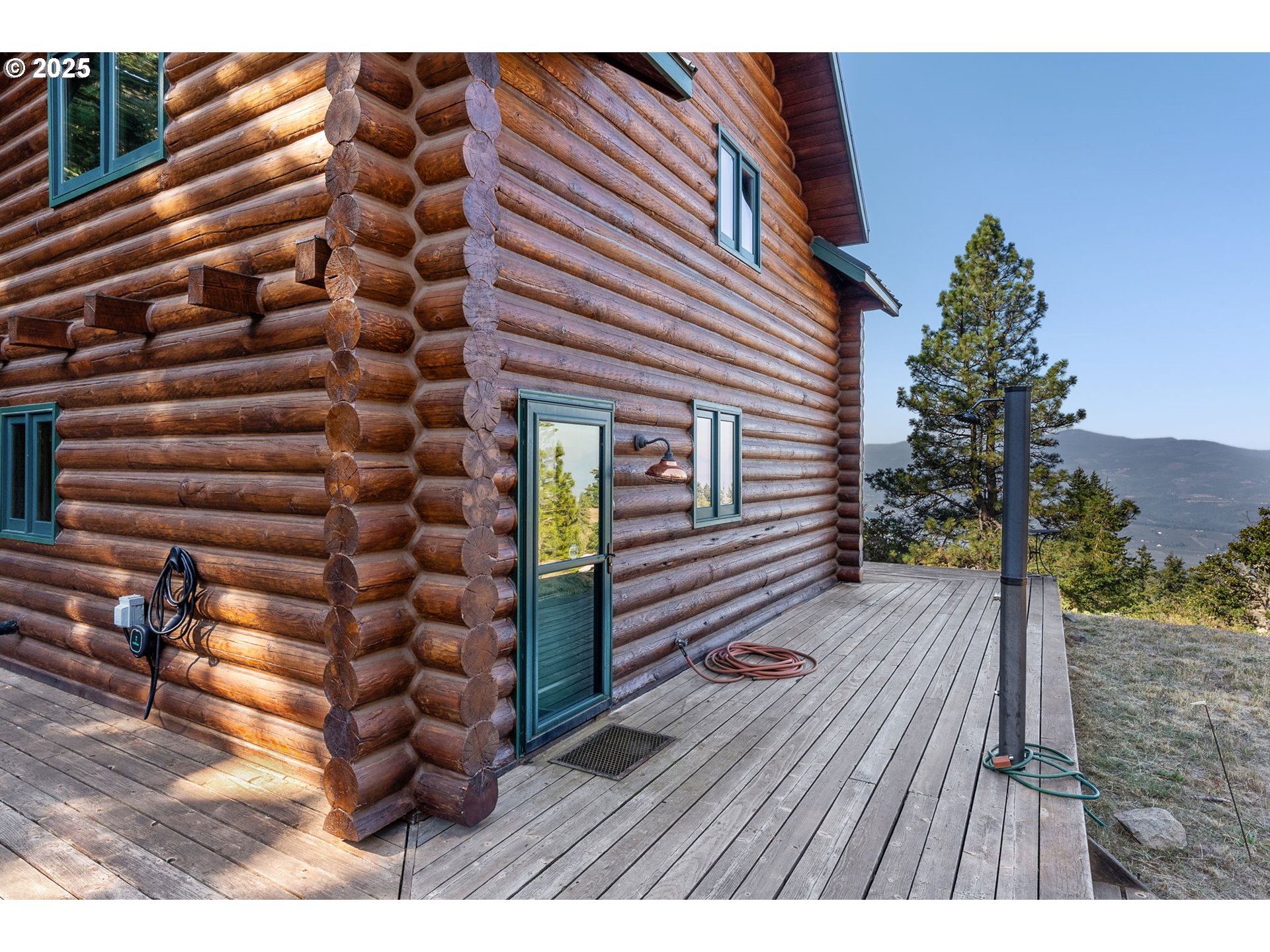 2300 Elder Road Hood River, OR 97031 - Photo 10 of 48 a view of a wooden door with a house
