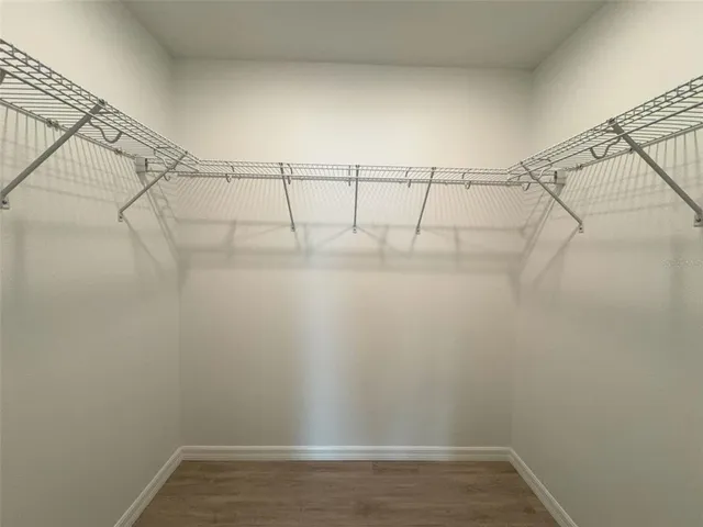 a view of a room with racks on the wall