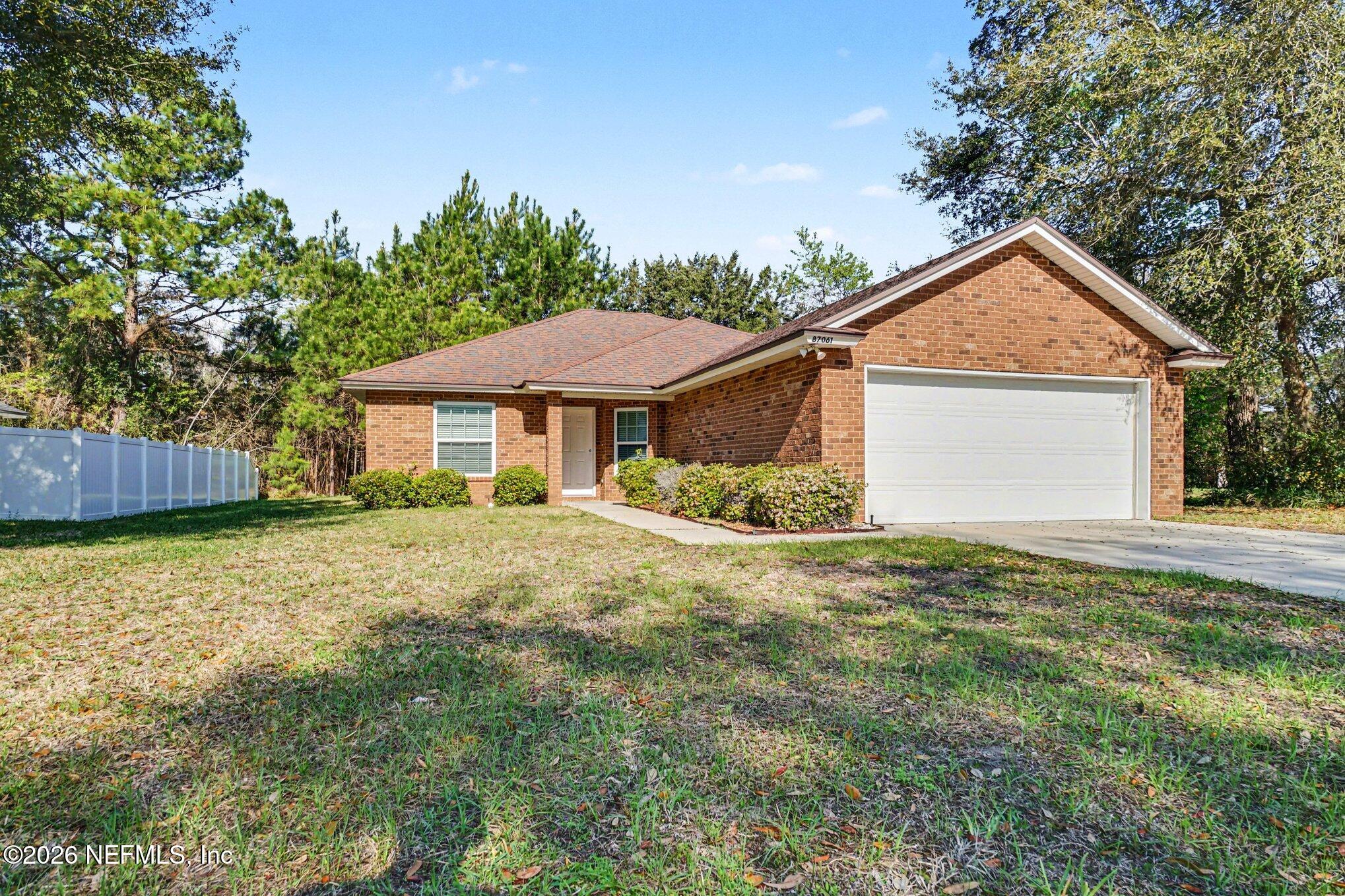87061 Farnsworth Lane Yulee, FL 32097 - Photo 1 of 15 001_dsc01326_297