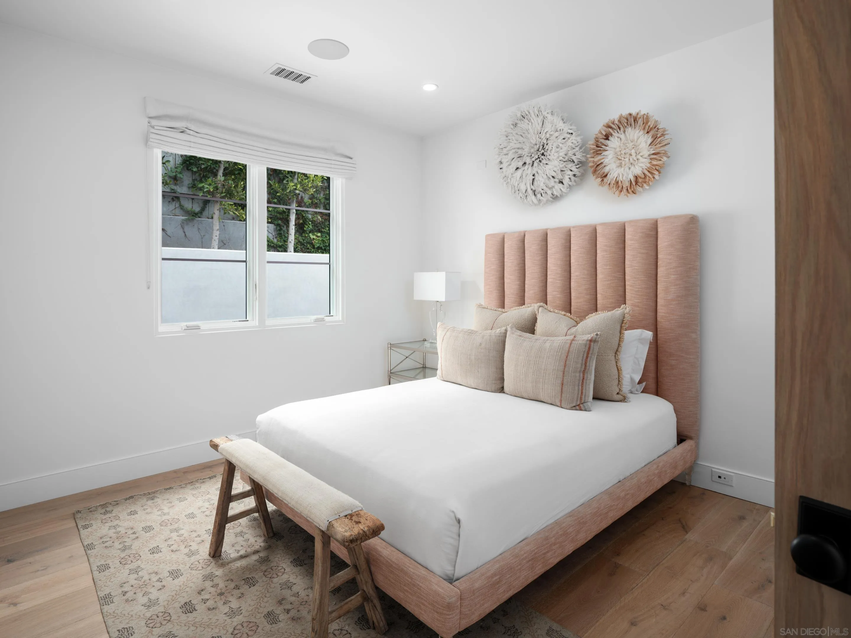 574 Amphitheatre Drive Del Mar, CA 92014 - Photo 31 of 37 a bedroom with a bed and a window