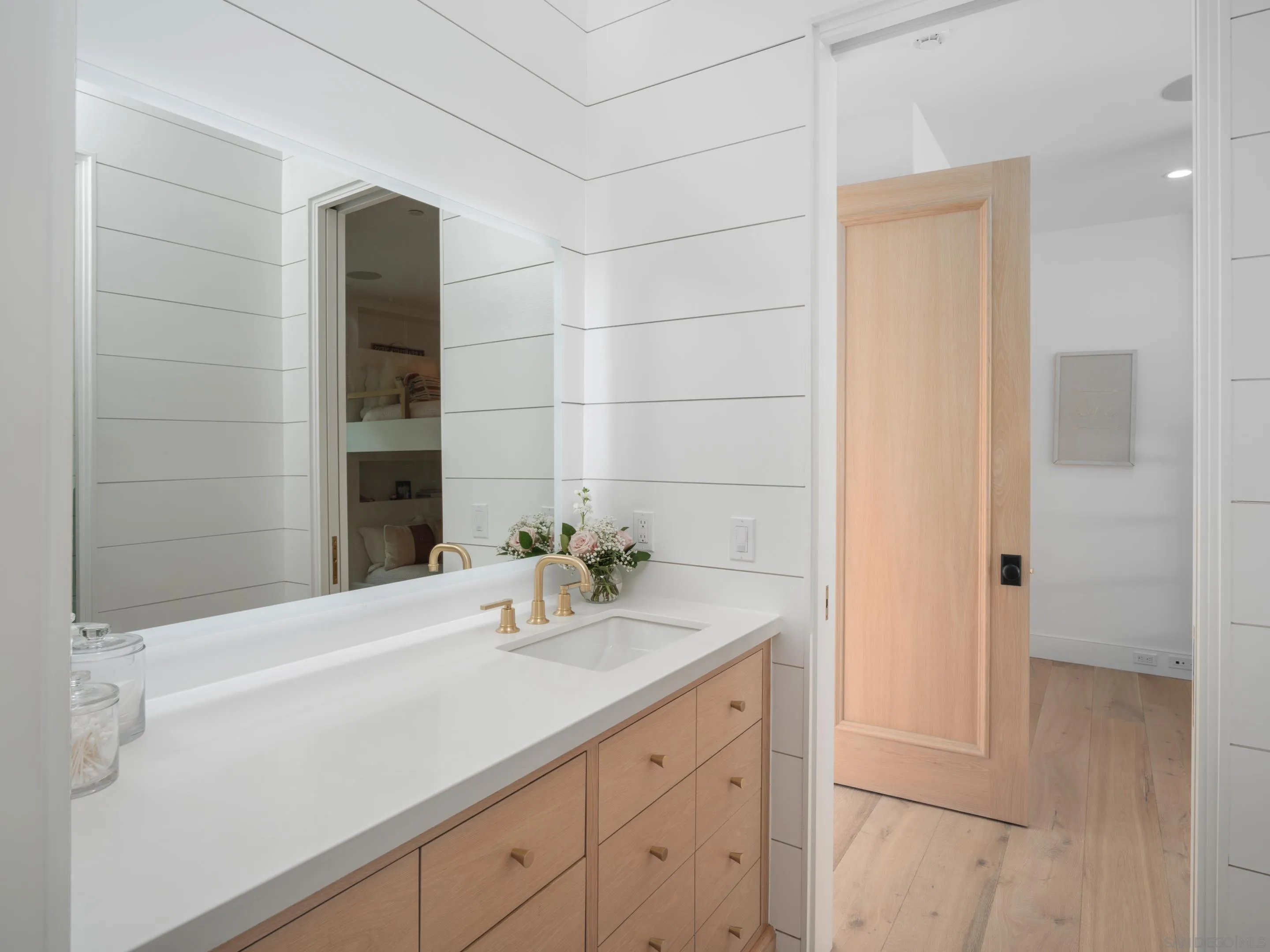 574 Amphitheatre Drive Del Mar, CA 92014 - Photo 33 of 37 a bathroom with a sink and a mirror