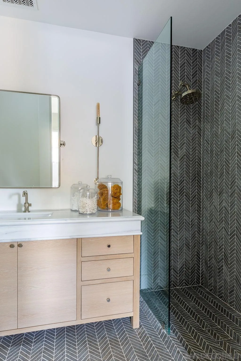 574 Amphitheatre Drive Del Mar, CA 92014 - Photo 36 of 37 a bathroom with a sink and a mirror