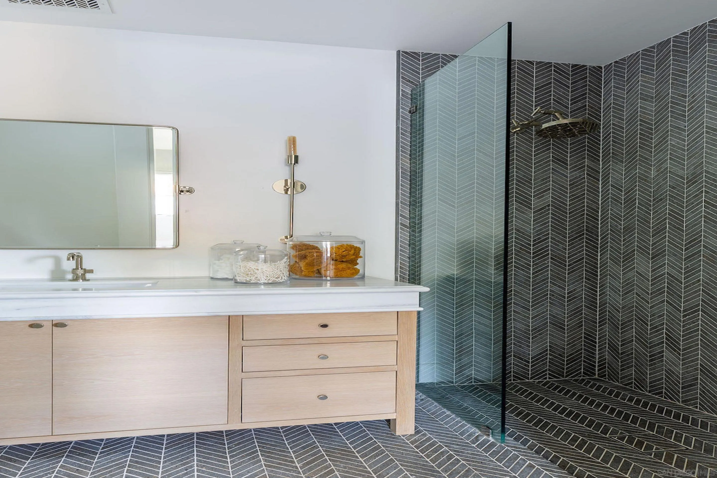 574 Amphitheatre Drive Del Mar, CA 92014 - Photo 37 of 37 a bathroom with a sink and a mirror