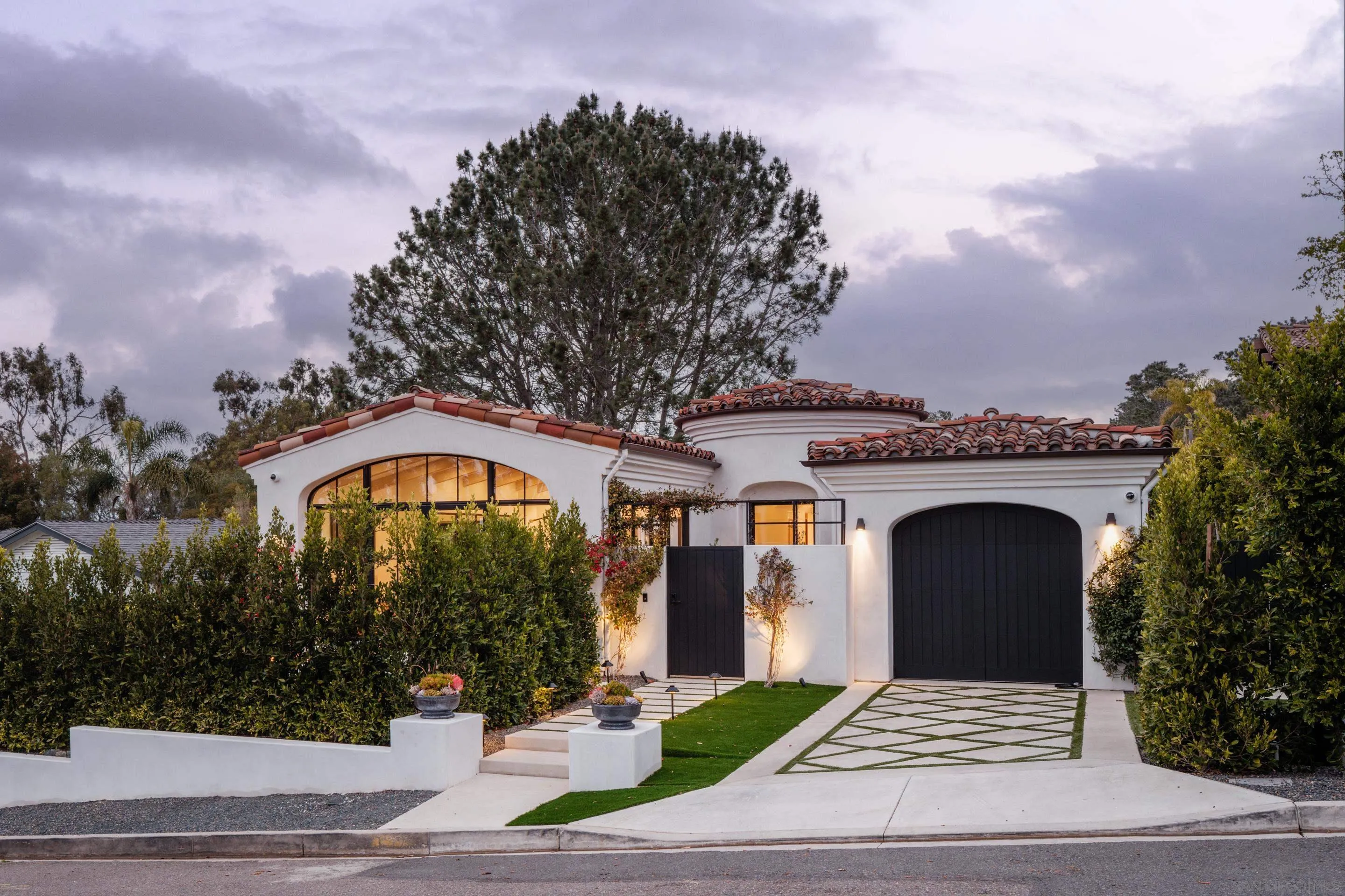 574 Amphitheatre Drive Del Mar, CA 92014 - Photo 4 of 37 a front view of a house with yard