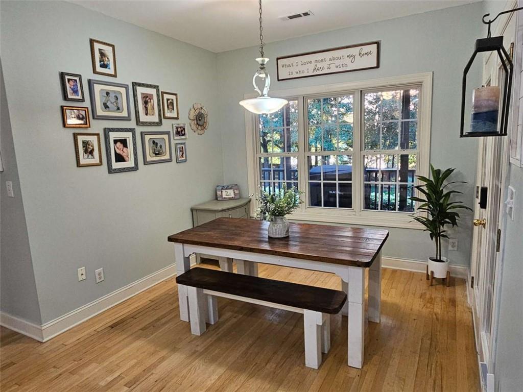 200 Chaparral Trace Tyrone, GA 30290 - Photo 17 of 52 a view of a dining room with furniture window and wooden floor