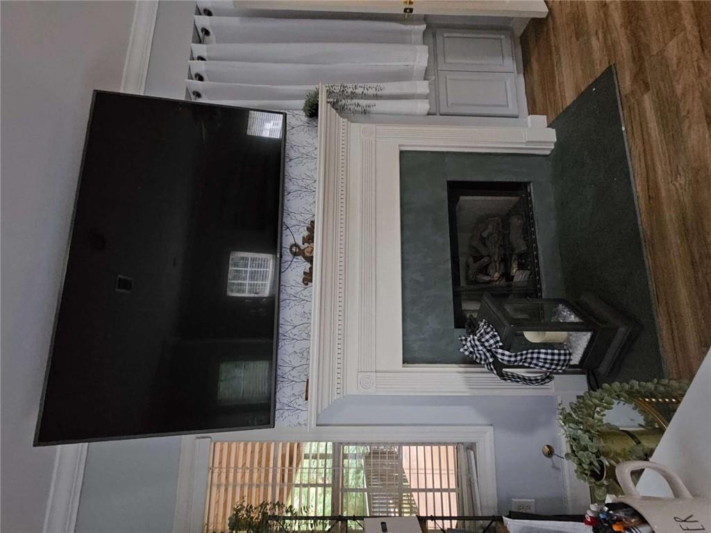 200 Chaparral Trace Tyrone, GA 30290 - Photo 22 of 52 a living room with furniture and a fireplace