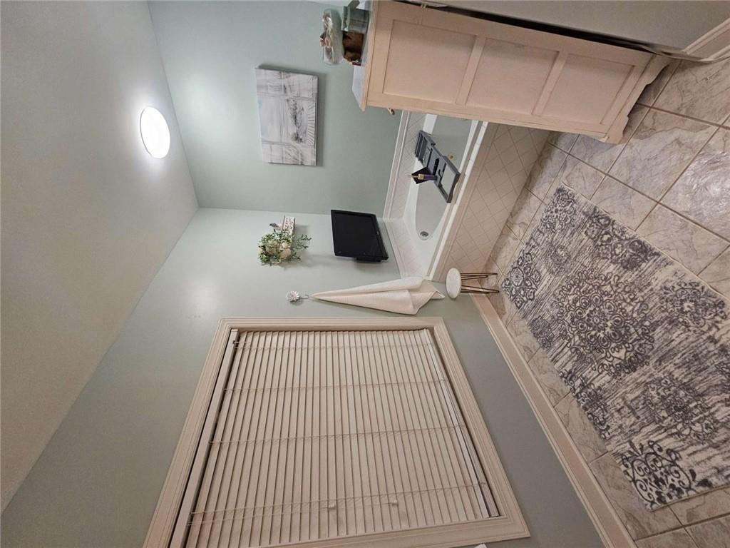 200 Chaparral Trace Tyrone, GA 30290 - Photo 24 of 52 a room with a window and couch