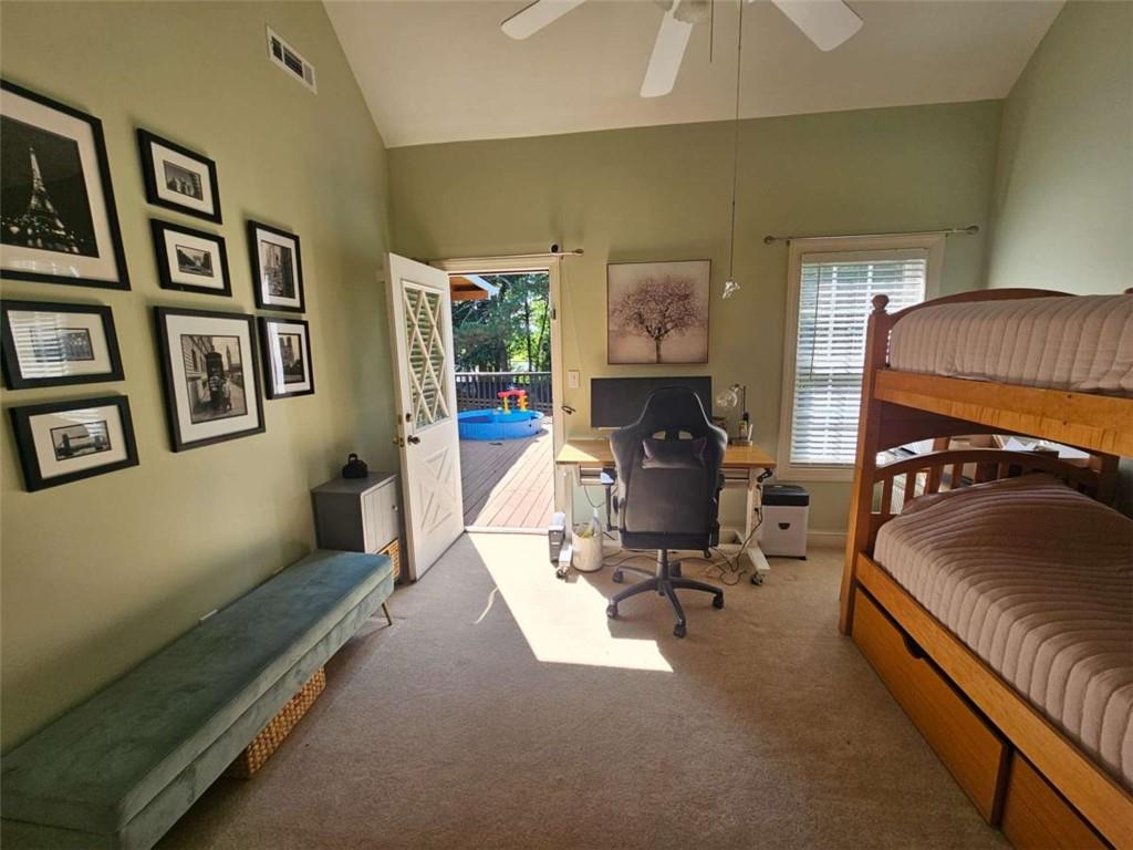 200 Chaparral Trace Tyrone, GA 30290 - Photo 29 of 52 a bedroom with furniture and a couch