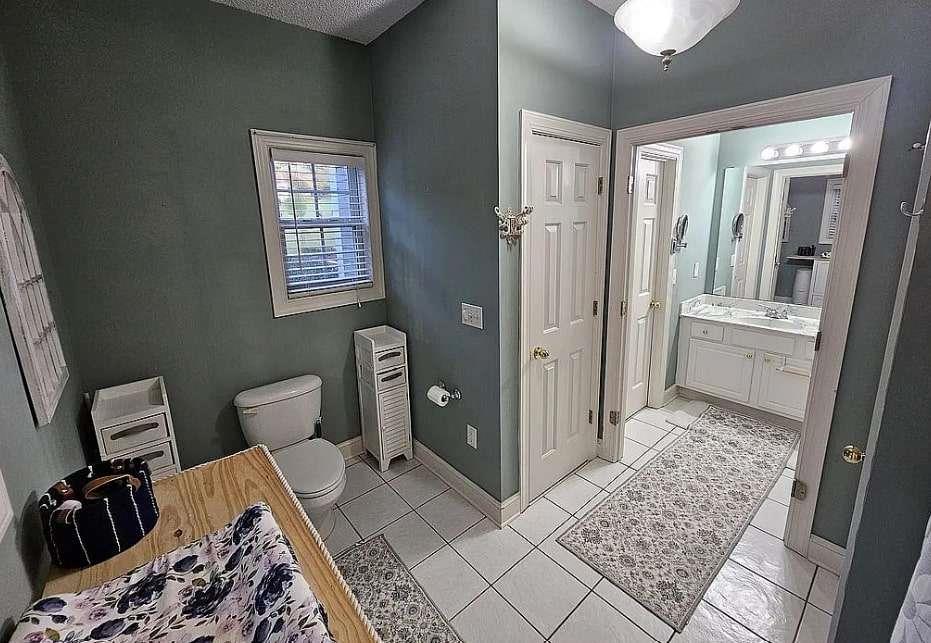 200 Chaparral Trace Tyrone, GA 30290 - Photo 30 of 52 a bedroom with a bed and a rug