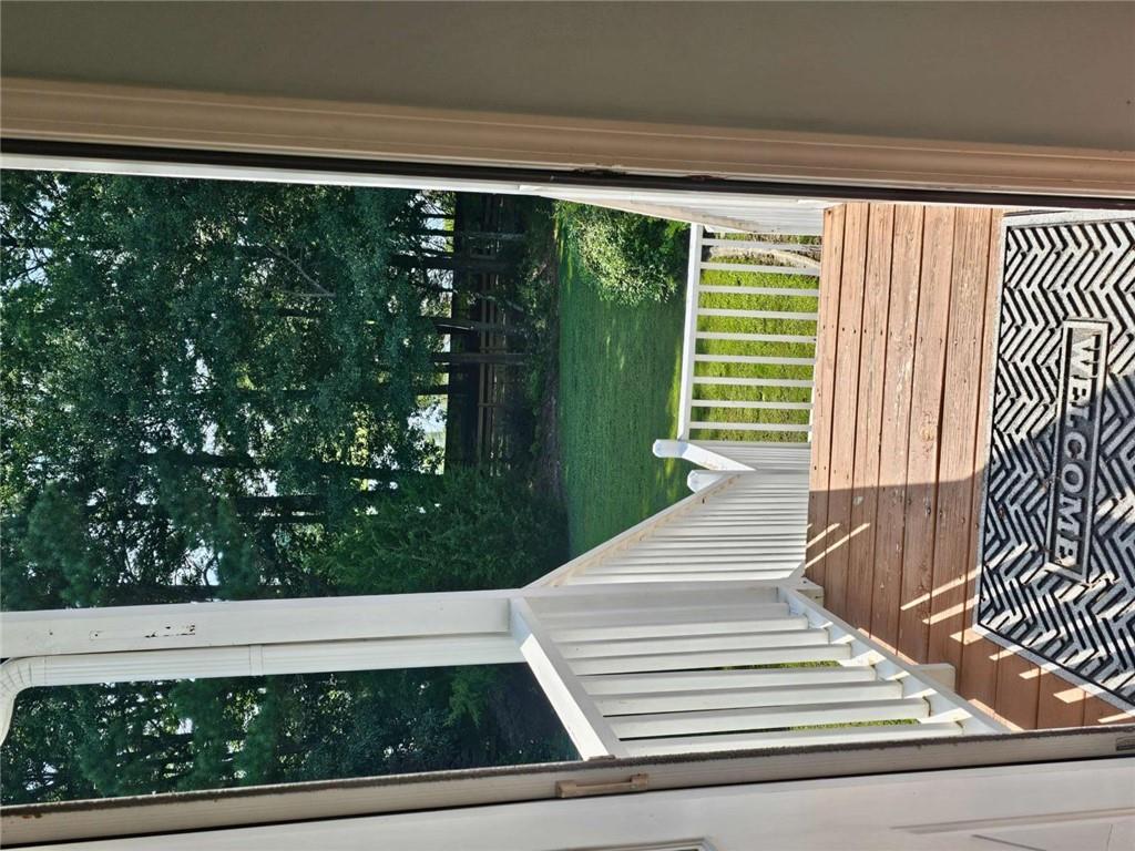 200 Chaparral Trace Tyrone, GA 30290 - Photo 36 of 52 a view of a balcony with wooden floor
