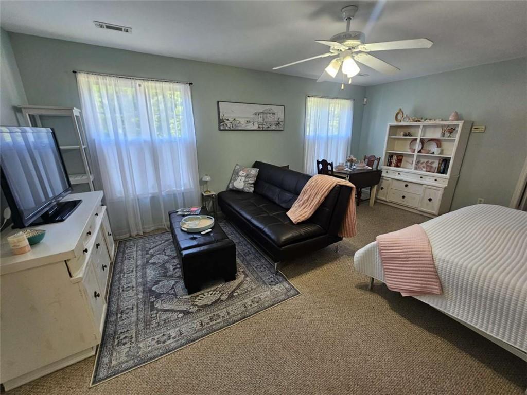 200 Chaparral Trace Tyrone, GA 30290 - Photo 37 of 52 a living room with furniture and a fireplace