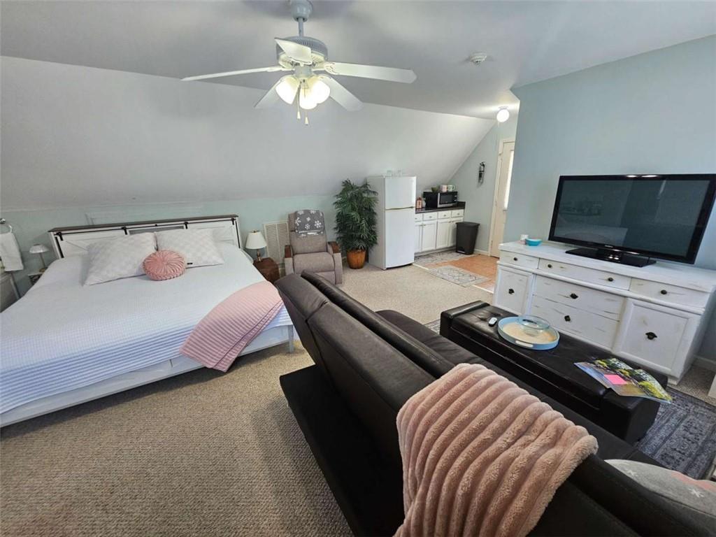 200 Chaparral Trace Tyrone, GA 30290 - Photo 38 of 52 a bedroom with a bed and a flat screen tv