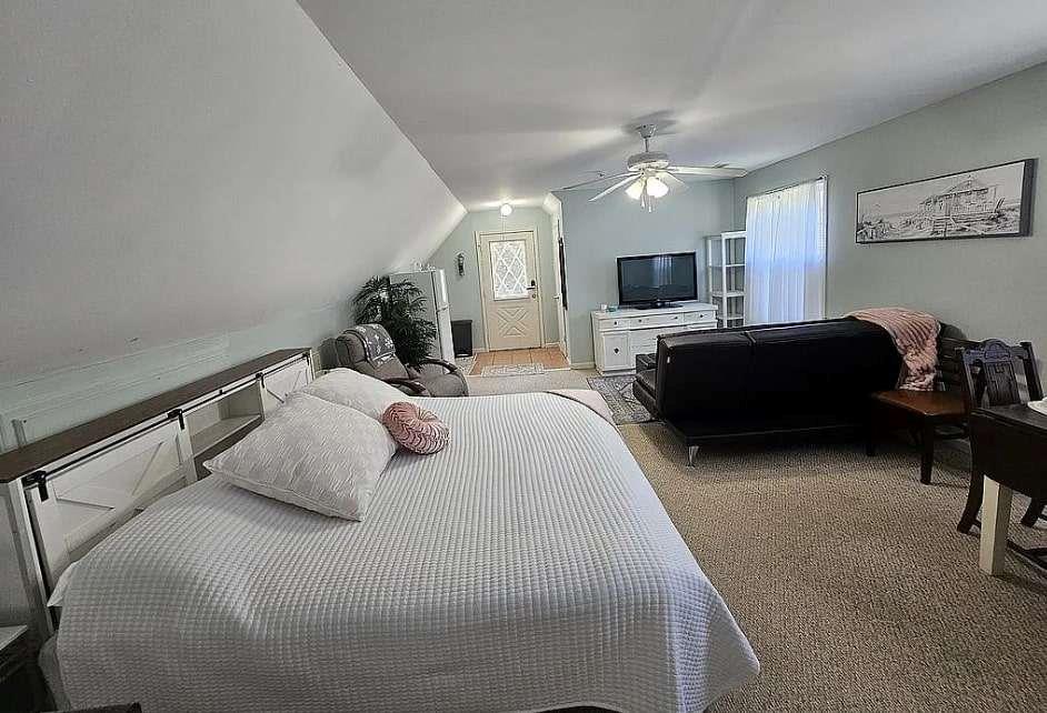 200 Chaparral Trace Tyrone, GA 30290 - Photo 40 of 52 a bedroom with a bed window and a chair