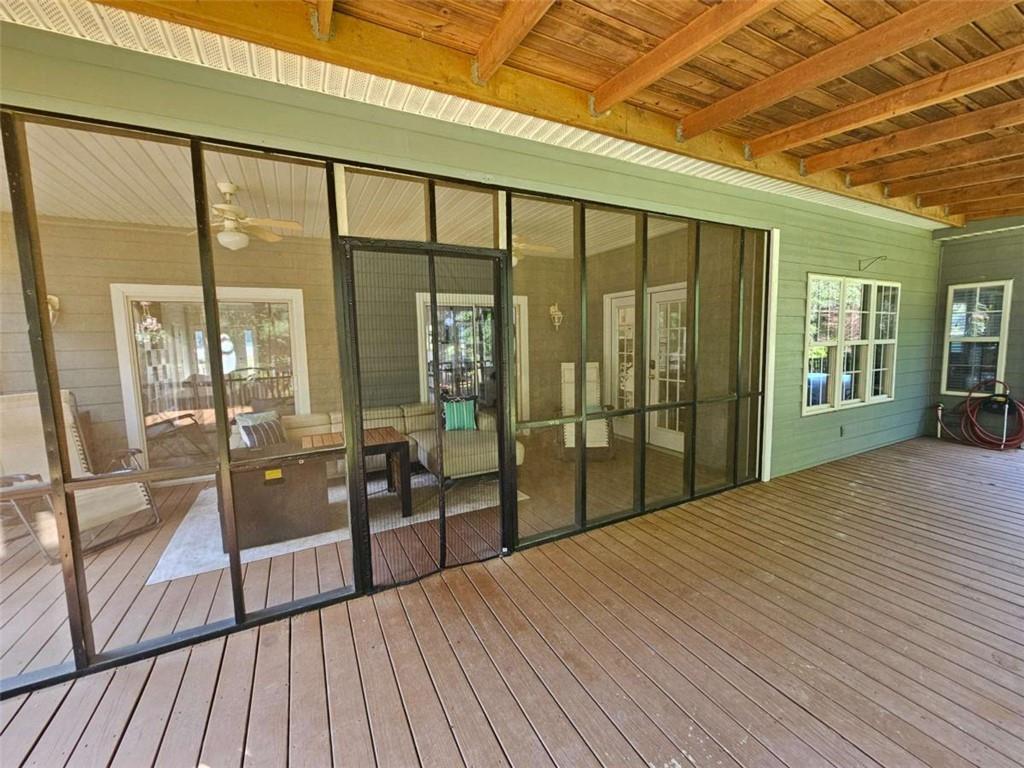 200 Chaparral Trace Tyrone, GA 30290 - Photo 44 of 52 a view of hallway with a large window and wooden floor