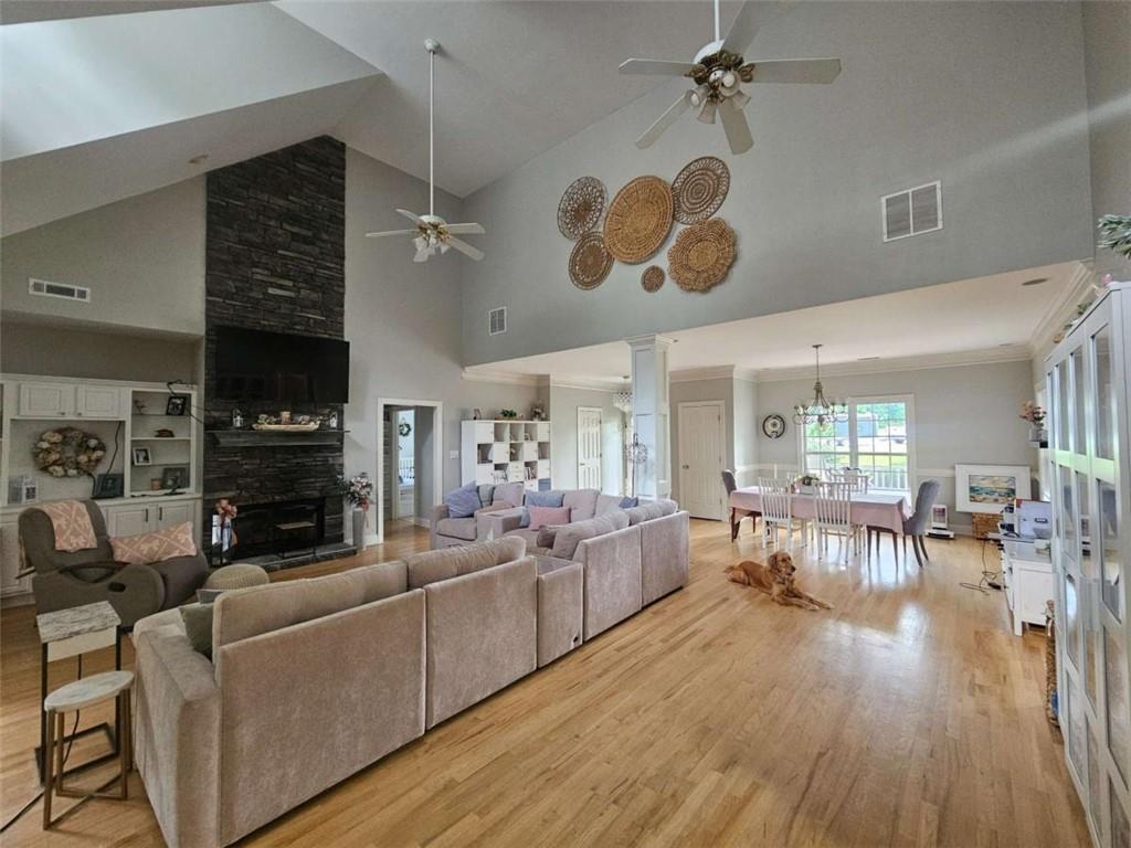200 Chaparral Trace Tyrone, GA 30290 - Photo 5 of 52 a living room with fireplace furniture and a wooden floor