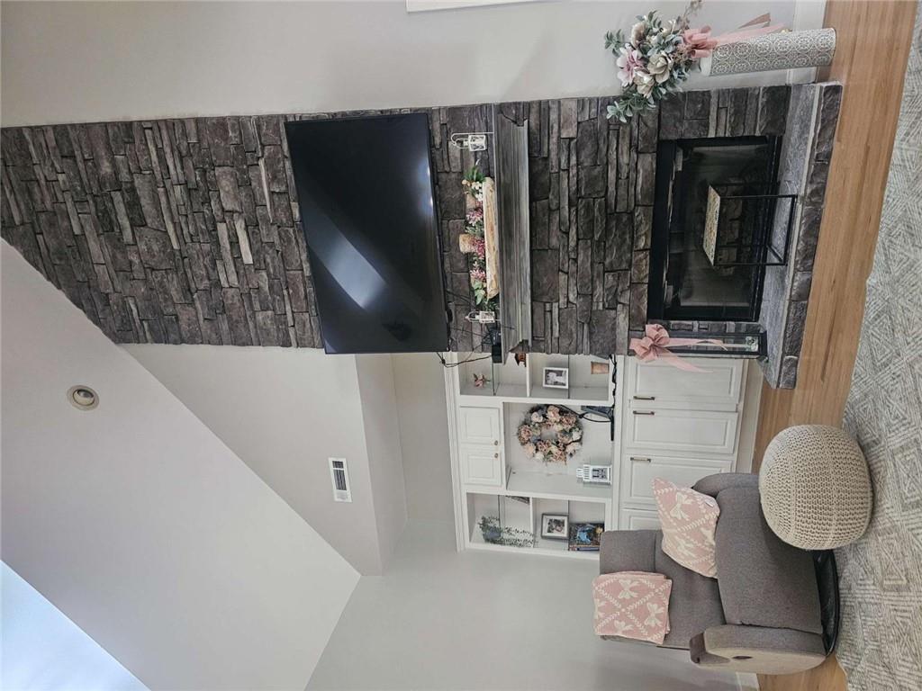 200 Chaparral Trace Tyrone, GA 30290 - Photo 6 of 52 a living room with furniture and a fireplace