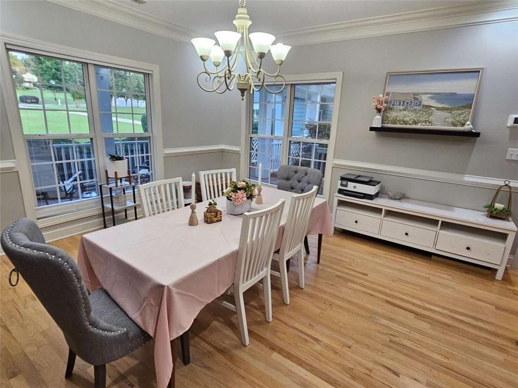 200 Chaparral Trace Tyrone, GA 30290 - Photo 9 of 52 a view of a dining room with furniture wooden floor and chandelier