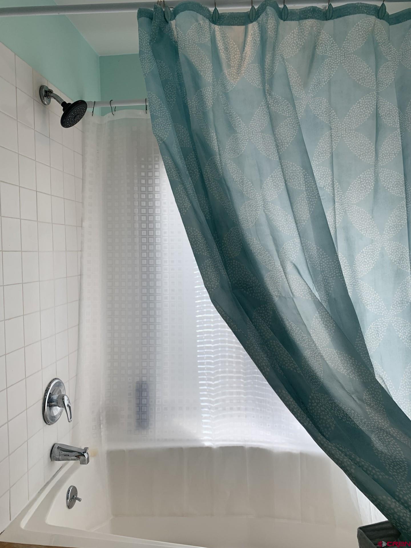 17679 2550 Road Cedaredge, CO 81413 - Photo 32 of 35 a view of a bathtub in a bathroom