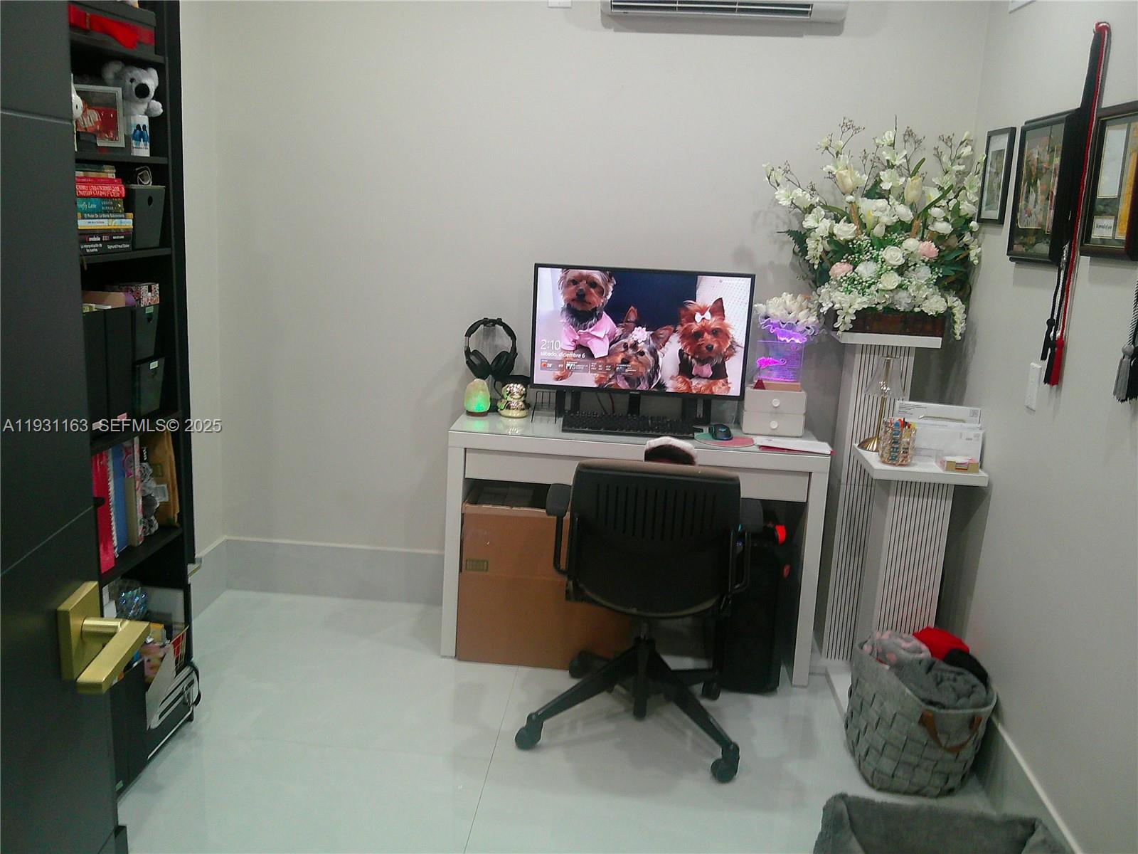 26831 Southwest 119th Court Homestead, FL 33032 - Photo 20 of 27 a view of a workspace with furniture and toys
